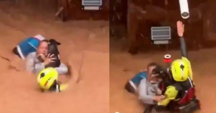 VÍDEO: Mulher se nega a abandonar seu cão durante enchente na Espanha e é resgatada por bombeiros